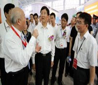 国家能源技术装备展开幕张国宝等参观国家核电技术公司展台