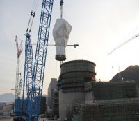 三门核电1#机组核岛一体化顶盖IHP成功吊装就位