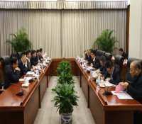 中核集团与上海电气共商深化合作