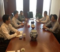 中核华兴公司陈宝智一行拜会明发集团总裁黄连春